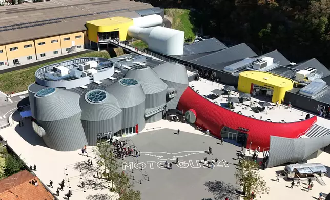 An overview of the Guzzi factory, during the opening inaugurating its completely redeveloped historic factory and new museum as the motorcycle maker celebrates its 105th anniversary, in Mandello del Lario, Thursday, Sept. 3, 2026. (AP Photo/Niccolo' Lupone)