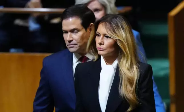 First lady Melania Trump, Secretary of State Marco Rubio and White House Chief of Staff Susan Wiles, arrive to listen to President Donald Trump speak to the United Nations General Assembly, Tuesday, Sept. 22, 2026, at the UN headquarters. (AP Photo/Julia Demaree Nikhinson)