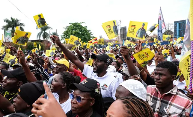 Members of the Patriotic League of Uganda demonstrate outside the Turkish Embassy demanding the extradition of a dissident, Fred Lumbuye, whose online activities are seen by local authorities as anti-government propaganda in Kampala, Uganda, Friday, Sept. 18, 2026. (AP Photo/Hajarah Nalwadda)