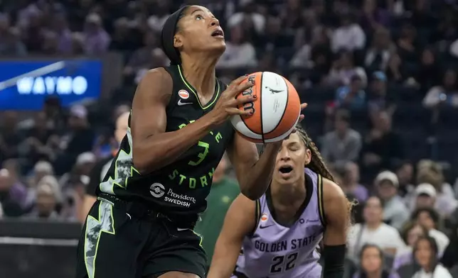 Seattle Storm guard-forward Taylor Thierry (3) shoots against Golden State Valkyries guard Veronica Burton (22) during the first half of a WNBA basketball game in San Francisco, Saturday, Sept. 19, 2026. (AP Photo/Jeff Chiu)