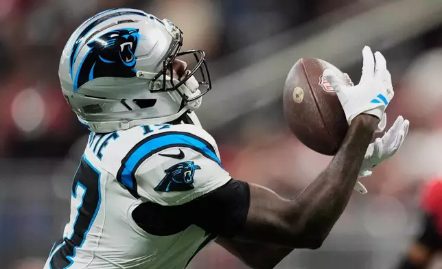 Carolina Panthers wide receiver Xavier Legette (17) makes a catch during an NFL football game against the Atlanta Falcons in Atlanta, Sunday, Sept. 20, 2026. (AP Photo/Mike Stewart)