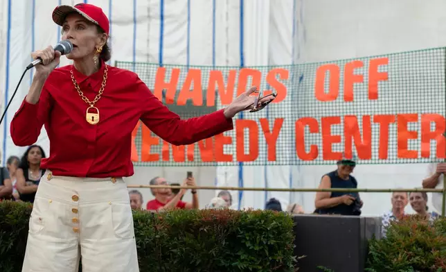 Actress Lynda Carter speaks to the crowd as they rally against the closing of the John F. Kennedy Center for the Performing Arts on Friday, Sept. 18, 2026, in Washington. ( (AP Photo/Jose Luis Magana)