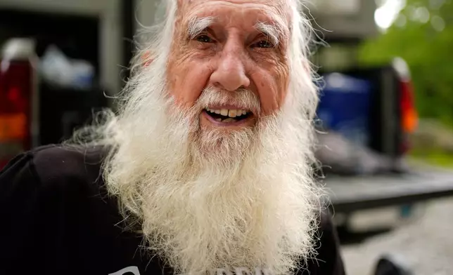 Grey Beard is a fitting trail name for 91-year-old Appalachian Trail hiker Dale Sanders, seen enjoying a rest, Wednesday, July 29, 2026, north of Monson, Maine. (AP Photo/Robert F. Bukaty)