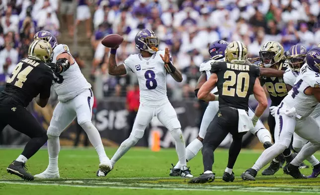 Baltimore Ravens quarterback Lamar Jackson (8) passes against the New Orleans Saints in the second half of an NFL football game in Baltimore, Sunday, Sept. 20, 2026. (AP Photo/Stephanie Scarbrough)