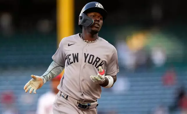 New York Yankees' Jazz Chisholm Jr. heads to third after hitting a solo home run during the first inning of a baseball game against the Los Angeles Angels, Tuesday, Sept. 1, 2026, in Anaheim, Calif. (AP Photo/Mark J. Terrill)