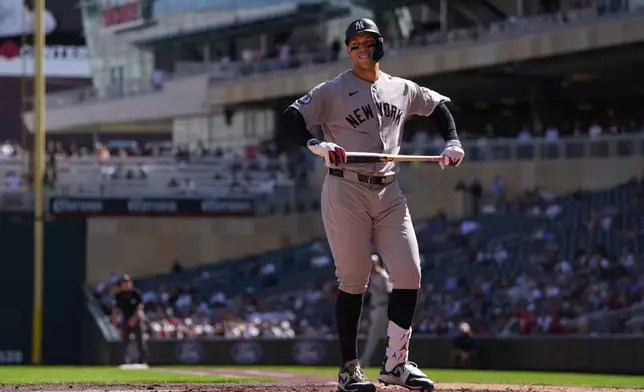 New York Yankees' Aaron Judge reacts after striking out during the third inning of a baseball game against the Minnesota Twins, Wednesday, Sept. 16, 2026, in Minneapolis. (AP Photo/Abbie Parr)