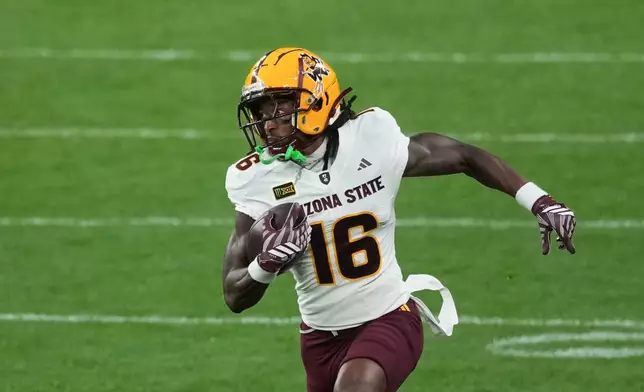 Arizona State Sun Devils wide receiver Jaren Hamilton (16) 100-yard kickoff return TD, during the NCAA college football game between Arizona State Sun Devils and Kansas Jayhawks in London, Saturday, Sept. 19, 2026. (AP Photo/Dave Shopland)