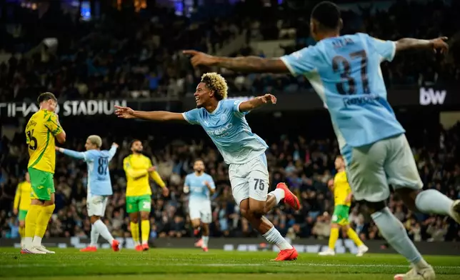 Manchester City's Floyd Samba celebrates after scoring first goal during the third-round English League Cup soccer match between Manchester City and Norwich City in Manchester, England, Thursday, Sept. 17, 2026. (AP Photo/Dave Thompson