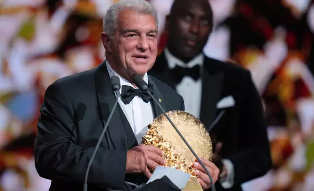 President of FC Barcelona Joan Laporta delivers a speech after receiving the "2026 Ballon d'Or Women's Club of the Year" trophy during the Ballon d'Or ceremony at the London Palladium Theatre in London, England, Monday, Oct. 26, 2026 . (AP Photo/Kin Cheung)