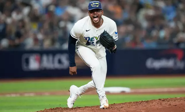 Tampa Bay Rays pitcher Freddy Peralta celebrates after striking out Cleveland Guardians' Petey Halpin during the sixth inning in Game 2 of an American League Championship Series baseball game in St. Petersburg, Fla. Tuesday, Oct. 13, 2026. (AP Photo/David J. Phillip)