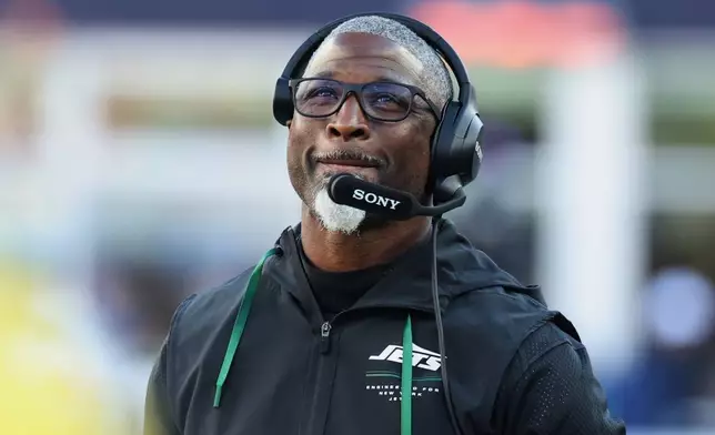 New York Jets head coach Aaron Glenn watches from the sideline during the second half of an NFL football game against the New England Patriots in Foxborough, Mass., Sunday, Oct. 18, 2026. (AP Photo/Mark Stockwell)
