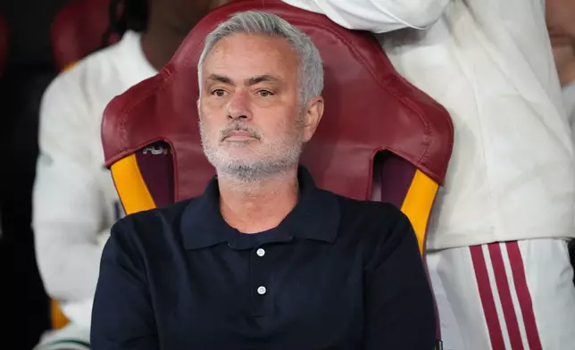 Real Madrid's head coach Jose Mourinho watches sitting on the bench during a Champions League opening phase soccer match between Roma and Real Madrid, in Rome, Wednesday, Oct.14, 2026. (AP Photo/Alessandra Tarantino)