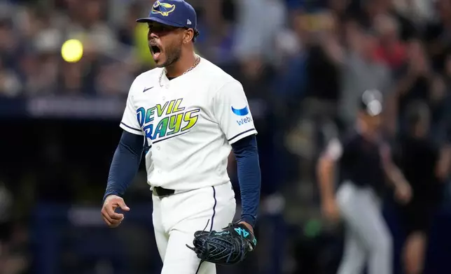 Tampa Bay Rays pitcher Freddy Peralta celebrates a strike out against the Cleveland Guardians during the third inning in Game 6 of an American League Championship Series baseball game in St. Petersburg, Fla. Monday, Oct. 19, 2026. (AP Photo/David J. Phillip)