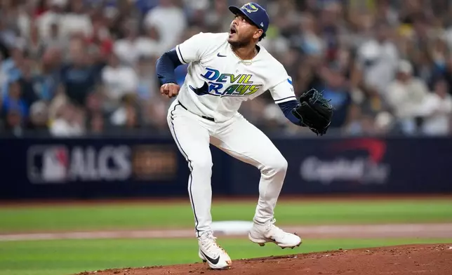 Tampa Bay Rays pitcher Freddy Peralta watches a pop up against the Cleveland Guardians during the first inning in Game 6 of an American League Championship Series baseball game in St. Petersburg, Fla. Monday, Oct. 19, 2026. (AP Photo/David J. Phillip)