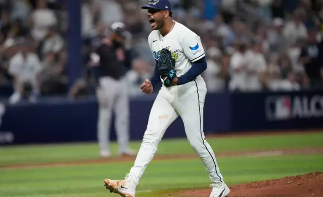 Tampa Bay Rays pitcher Freddy Peralta celebrates the end of the top of the fourth inning against the Cleveland Guardians in Game 6 of an American League Championship Series baseball game in St. Petersburg, Fla. Monday, Oct. 19, 2026. (AP Photo/David J. Phillip)