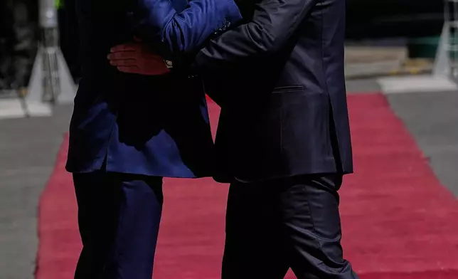Bolivian President Rodrigo Paz, right, greets Chile's President Jose Antonio Kast at the government palace in La Paz, Bolivia, Friday, Oct. 16, 2026. (AP Photo/Juan Karita)