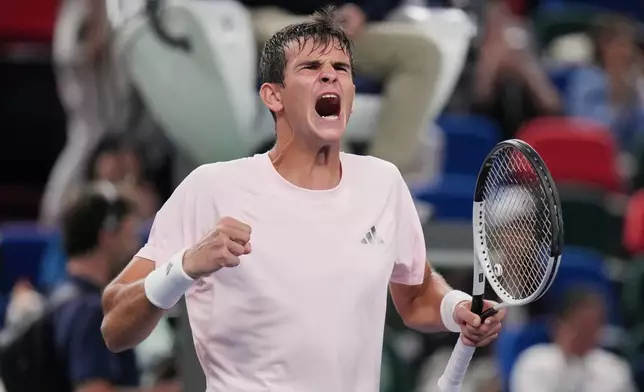 Spain's Rafael Jodar celebrates after winning the men's singles quarterfinals match against Norway's Casper Ruud at the Shanghai Masters tennis tournament in Shanghai, China, Friday, Oct. 16, 2026. (AP Photo/Andy Wong)