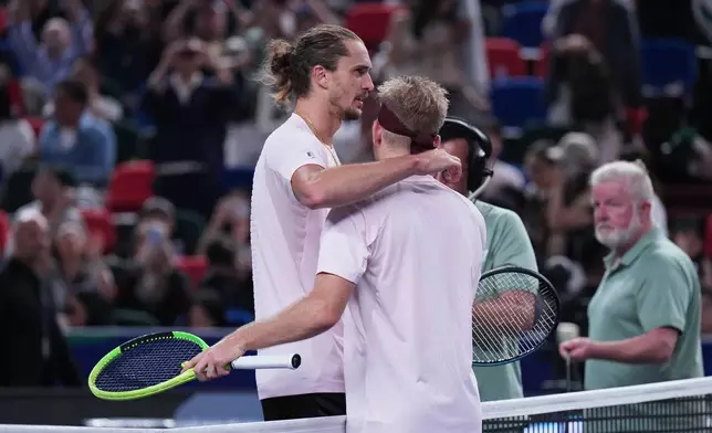 Spain's Alejandro Davidovich Fokina is congratulated by Germany's Alexander Zverev after winning the men's singles semifinal match at the Shanghai Masters tennis tournament in Shanghai, China, Saturday, Oct. 17, 2026. (AP Photo/Andy Wong)