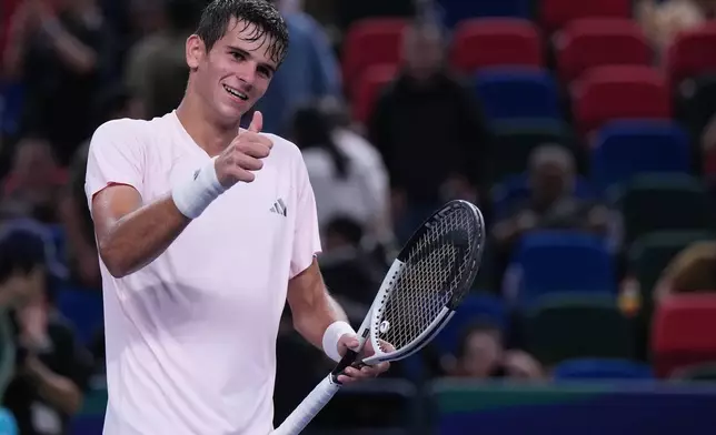 Spain's Rafael Jodar celebrates after winning against Russia's Daniil Medvedev in the men's singles semifinal match at the Shanghai Masters tennis tournament in Shanghai, China, Saturday, Oct. 17, 2026. (AP Photo/Andy Wong)
