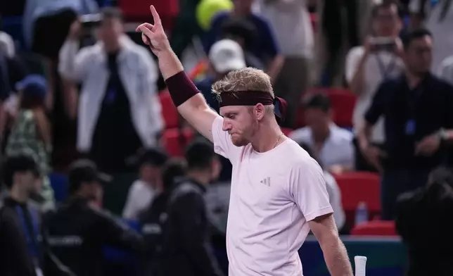 Spain's Alejandro Davidovich Fokina celebrates after winning the men's singles semifinal match against Germany's Alexander Zverev at the Shanghai Masters tennis tournament in Shanghai, China, Saturday, Oct. 17, 2026. (AP Photo/Andy Wong)