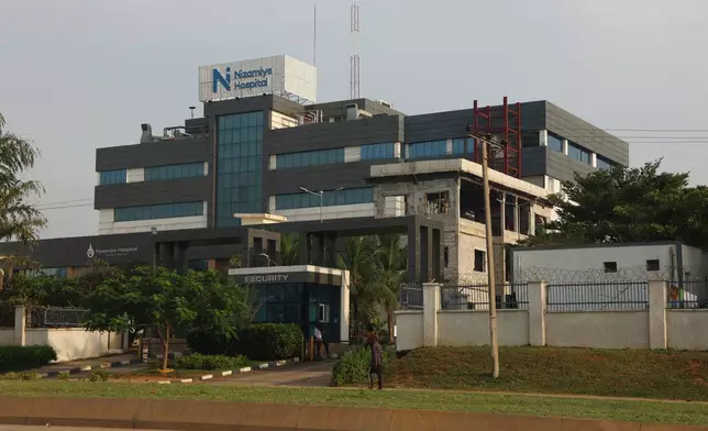 A man walks past a hospital in Abuja, Nigeria, Wednesday, Oct. 21, 2026. (AP Photo/Afolabi Sotunde)