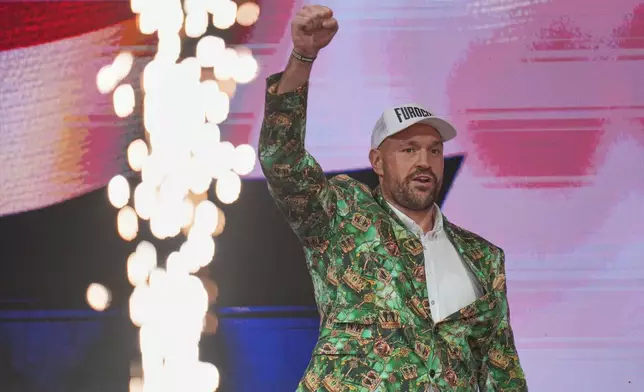 Tyson Fury during a Press Conference with Anthony Joshua in London, Wednesday, Sept. 30, 2026, to promote their upcoming fight which will take place at the Principality Stadium in Cardiff on Dec.11.(AP Photo/Kin Cheung)