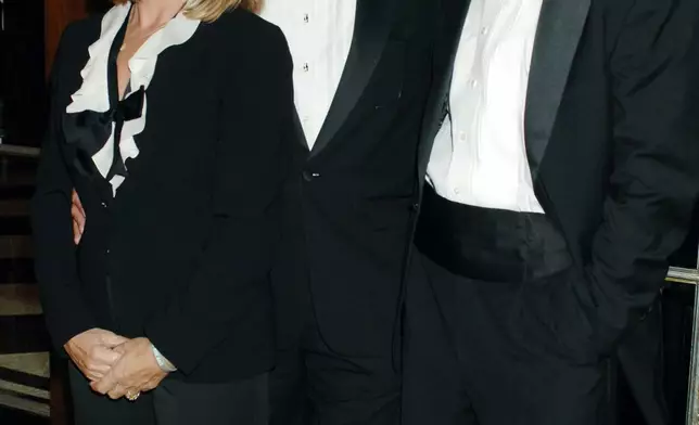 FILE - Dick Ebersol, center, chairman NBC Universal Sports and Olympics, poses with his wife, Susan Saint James, left, and their son, Charlie Ebersol, before Dick Ebersol was inducted into the Broadcasting & Cable Hall of Fame during in New York on Oct. 24, 2005. (AP Photo/Henny Ray Abrams, File)