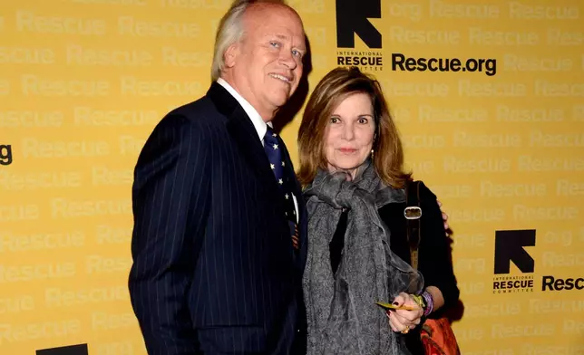 FILE - NBC Sports Chairman Dick Ebersol and his wife, actress Susan Saint James, appear at the International Rescue Committee Freedom Award Dinner in New York on Nov. 9, 2011. (AP Photo/Eric Reichbaum, File)