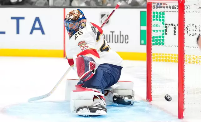 Florida Panthers goaltender Jacob Markstrom deflects a shot during the second period of an NHL hockey game against the Los Angeles Kings, Tuesday, Oct. 6, 2026, in Los Angeles. (AP Photo/Mark J. Terrill)