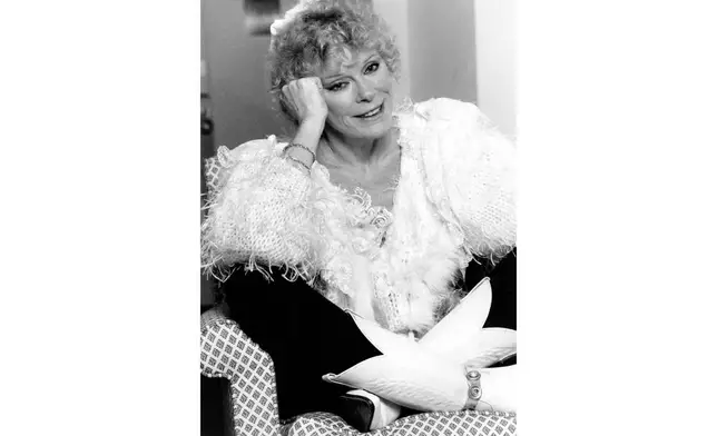 FILE - Actress Elke Sommer poses in New York on Jan. 8, 1990. (AP Photo/Marty Reichenthal, File)