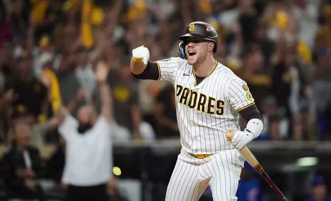 San Diego Padres Gavin Sheets celebrates his two-run home run against the Chicago Cubs in the fourth inning of Game 2 of the National League Wild Card baseball playoff series Wednesday, Sept. 30, 2026, in San Diego. (AP Photo/Gregory Bull)