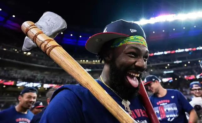 Atlanta Braves' Michael Harris II celebrates after Game 3 of baseball's NL Wild Card Series against the Philadelphia Phillies, Thursday, Oct. 1, 2026, in Atlanta. (AP Photo/Brynn Anderson)