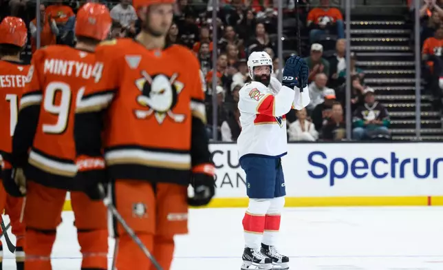 Florida Panthers defenseman Radko Gudas (6) applauds towards the stands during the first period of an NHL hockey game against the Anaheim Ducks, Sunday, Oct. 4, 2026, in Anaheim, Calif. (AP Photo/Kyusung Gong)