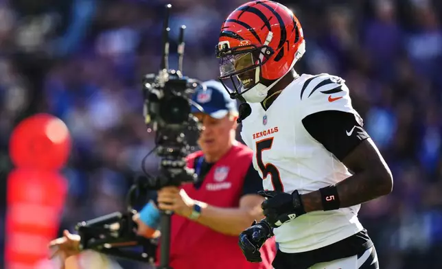 Cincinnati Bengals wide receiver Tee Higgins (5) celebrates a touchdown during the second half of an NFL football game against the Baltimore Ravens in Baltimore, Sunday, Oct. 25, 2026. (AP Photo/Stephanie Scarbrough)