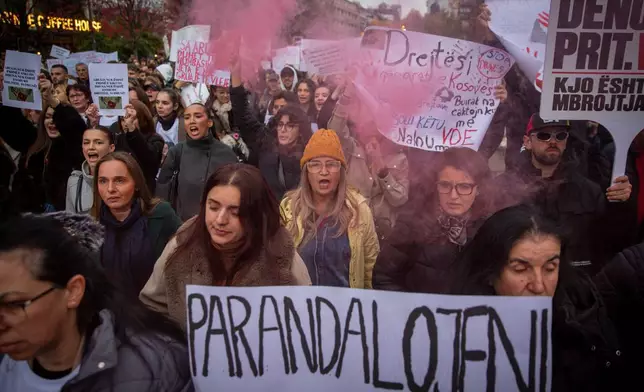 Thousands protest the killing of Kosovo-American woman Arlinda Zekaj, whose death sparked public outrage and renewed calls for accountability over violence against women, in Pristina, Kosovo, on Wednesday, Oct. 28, 2026. (AP Photo/Visar Kryeziu)