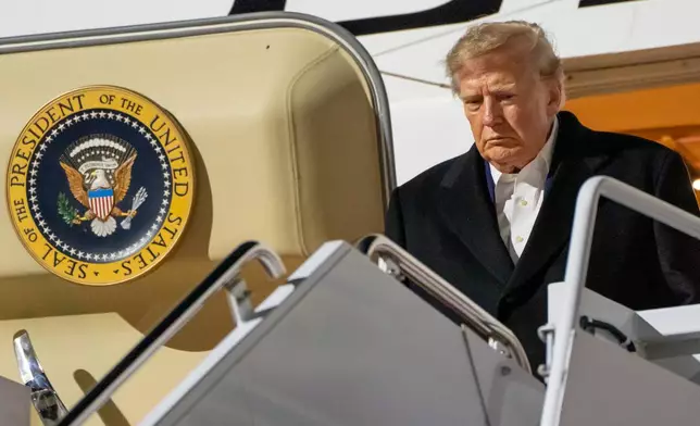 President Donald Trump arrives at Harry Reid International Airport, Wednesday, Oct. 14, 2026, in Las Vegas, Nev. (AP Photo/Alex Brandon)