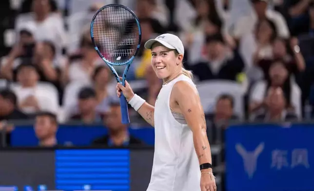 Sonay Kartal of Britain celebrates after defeating against Jelena Ostapenko of Latvia in a women's singles semifinal match during the 2026 Wuhan Open tennis tournament in Wuhan in central China's Hubei Province on Saturday, Oct. 17, 2026. (Chinatopix Via AP)