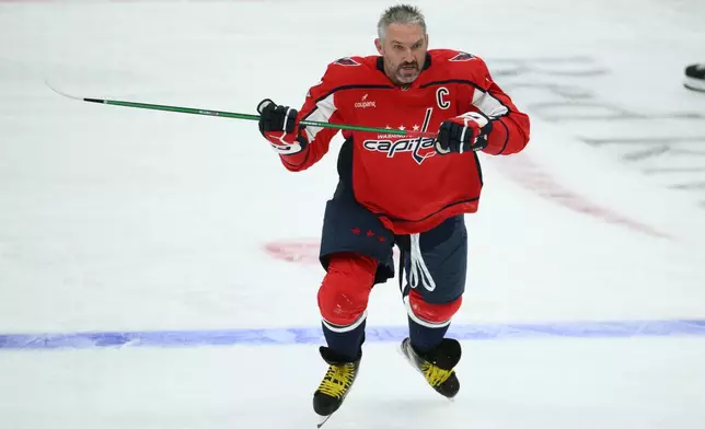 Washington Capitals left wing Alex Ovechkin (8) warms up before an NHL hockey game against the Pittsburgh Penguins, Wednesday, Oct. 7, 2026, in Washington. (AP Photo/Nick Wass)