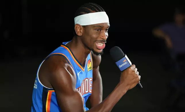 Oklahoma City Thunder's Shai Gilgeous-Alexander gives an interview during the NBA basketball team's media day Monday, Sept. 28, 2026, in Oklahoma City. (AP Photo/Nate Billings)