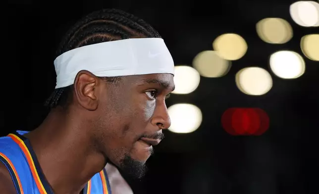 Oklahoma City Thunder's Shai Gilgeous-Alexander listens while giving an interview during the NBA basketball team's media day Monday, Sept. 28, 2026, in Oklahoma City. (AP Photo/Nate Billings)