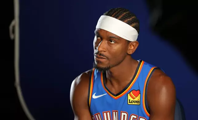 Oklahoma City Thunder's Shai Gilgeous-Alexander pauses while giving an interview during the NBA basketball team's media day Monday, Sept. 28, 2026, in Oklahoma City. (AP Photo/Nate Billings)