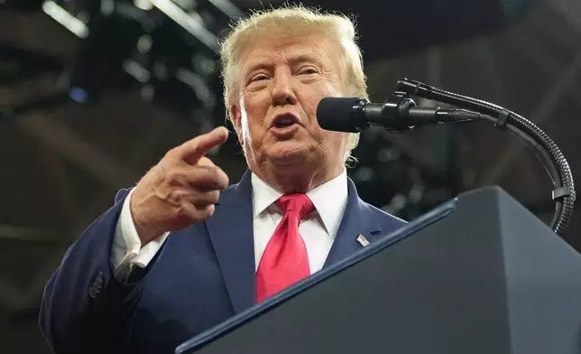 President Donald Trump speaks at a campaign rally at Alico Arena on the campus of Florida Gulf Coast University, Friday, Oct. 23, 2026, in Fort Myers, Fla. (AP Photo/Mark Schiefelbein)