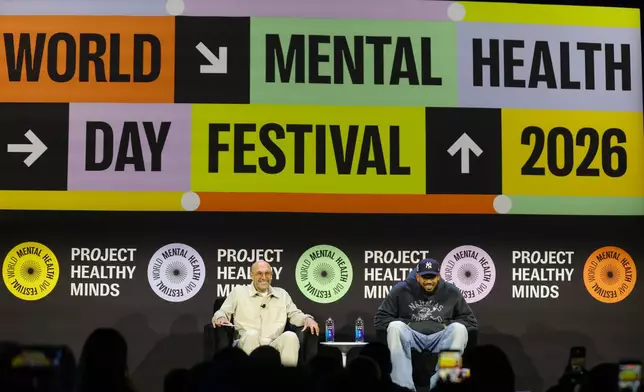 Rich Kleiman, left, and NBA player Karl-Anthony Towns of the New York Knicks sit for a discussion at the Project Healthy Minds World Mental Health Day Festival, Saturday, Oct. 10, 2026, in New York. (AP Photo/Heather Khalifa)
