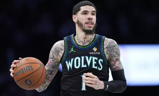 Minnesota Timberwolves guard LaMelo Ball dribbles downcourt during the second half of an NBA Cup basketball game against the Los Angeles Clippers, Friday, Oct. 30, 2026, in Minneapolis. (AP Photo/Abbie Parr)