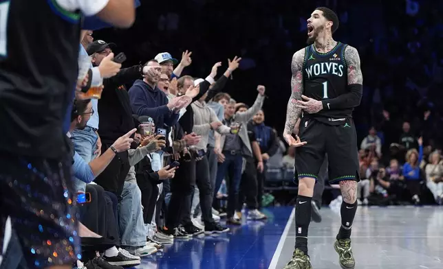 Minnesota Timberwolves guard LaMelo Ball (1) celebrates after making a 3-point basket during the second half of an NBA Cup basketball game against the Los Angeles Clippers, Friday, Oct. 30, 2026, in Minneapolis. (AP Photo/Abbie Parr)