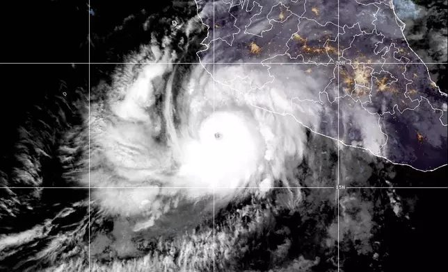 This satellite image provided by the National Oceanic and Atmospheric Administration, or NOAA shows Hurricane Simon in the Pacific on Saturday, Oct. 10, 2026. (National Oceanic and Atmospheric Administration via AP)