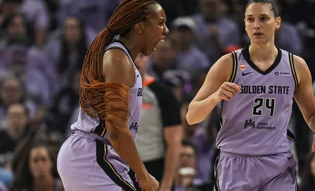 Golden State Valkyries forward Kayla Thornton, left, reacts after forcing a turnover against the Atlanta Dream during the first half of Game 2 of the WNBA basketball finals, Monday, Oct. 19, 2026, in San Francisco. (AP Photo/Justine Willard)