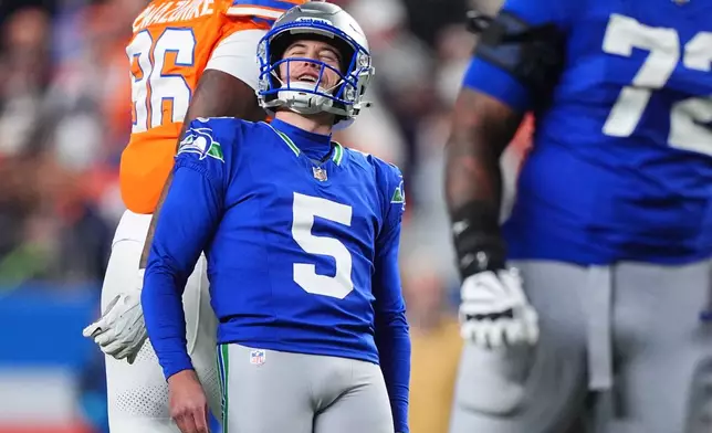 Seattle Seahawks place-kicker Jason Myers reacts after missing a field goal against the Denver Broncos during the second half of an NFL football game in Denver, Thursday, Oct. 15, 2026. (AP Photo/David Zalubowski)