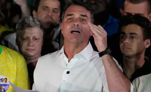 Opposition presidential candidate Sen. Flavio Bolsonaro speaks after the presidential runoff in Brasilia, Brazil, Sunday, Oct. 25, 2026. (AP Photo/Eraldo Peres)