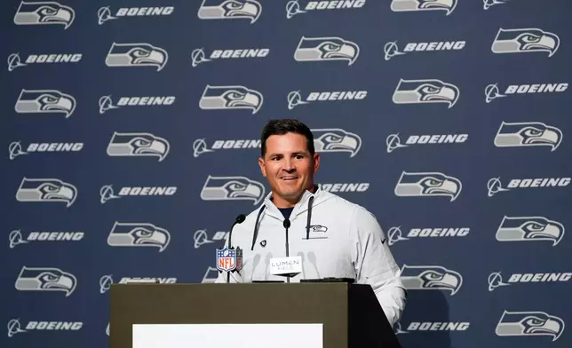 Seattle Seahawks head coach Mike Macdonald speaks during a news conference after an NFL football game against the Los Angeles Chargers, Sunday, Oct. 4, 2026, in Seattle. (AP Photo/Lindsey Wasson)